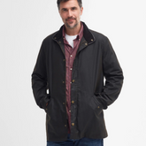 Man Wears Barbour Mens Mowden Wax Jacket in Olive